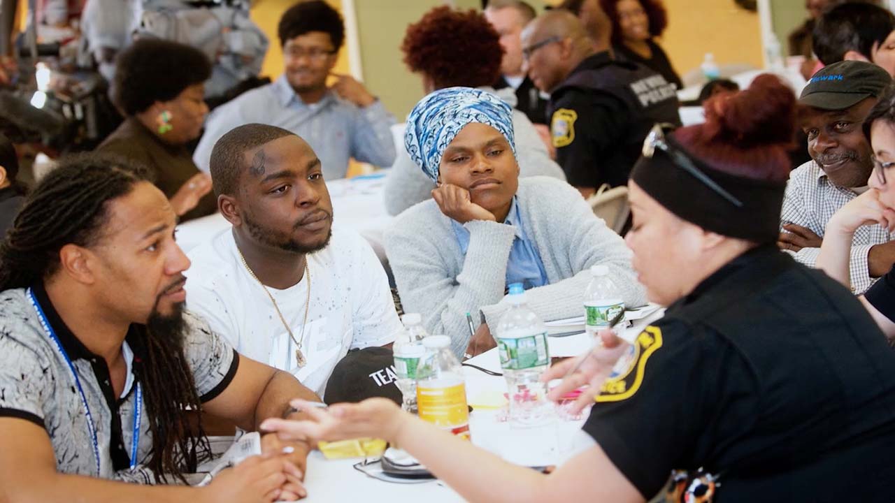 Improving trust and fairness in community policing