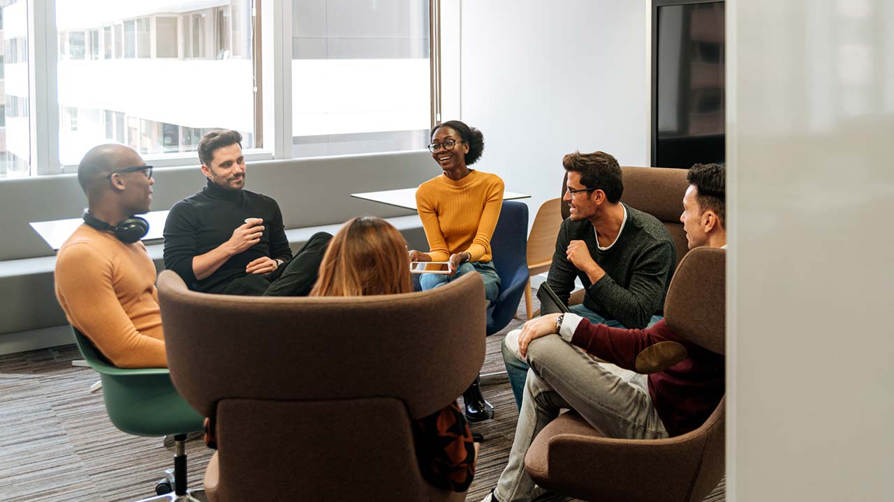 contemporary group of workers meeting casually